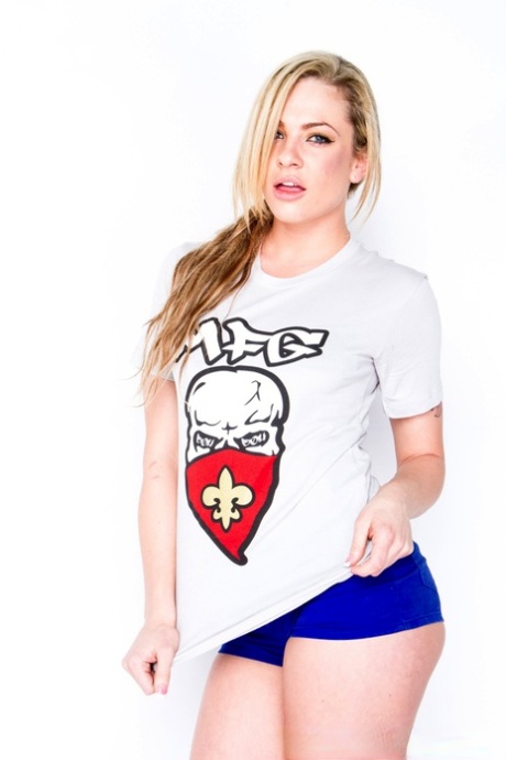 Sexy blonde Dahlia Sky models a T-shirt and booty shorts during SFW action 82962495