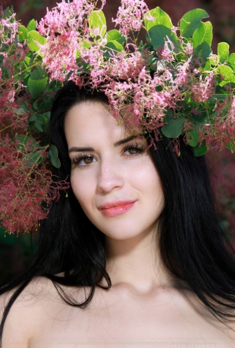 Brunette teen Lola Marron strikes great nude poses in front of bushes 11775425