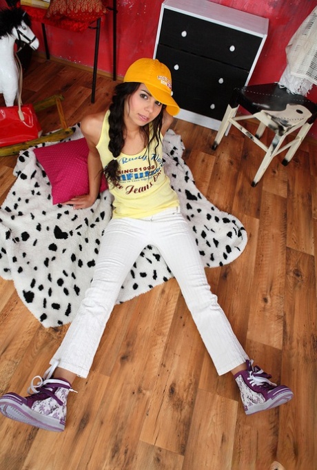 Barely legal girl masturbates with a vibrator in a ballcap 63669700
