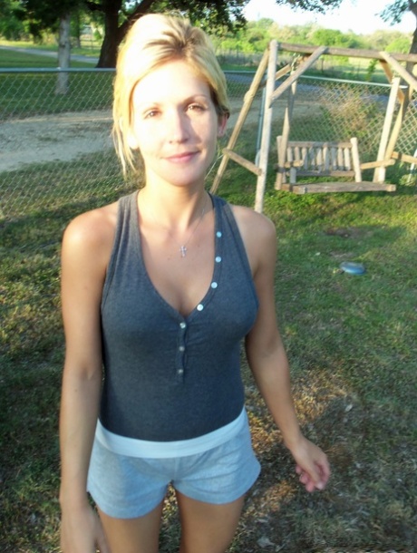 Hot blonde amateur is caught hamming it up in various candid shots 80375817