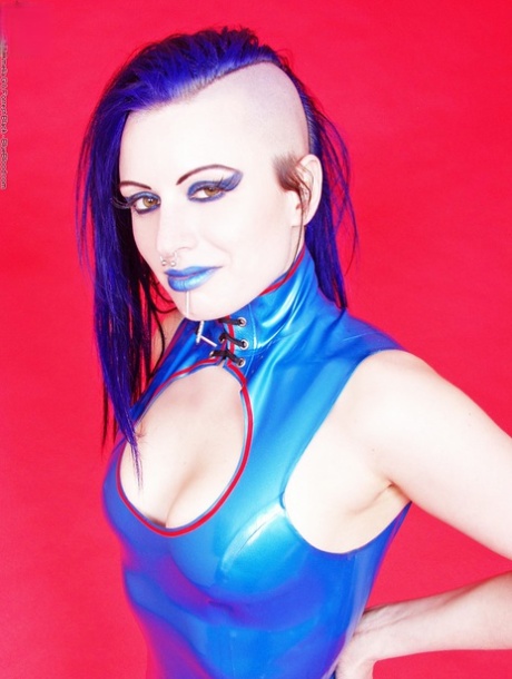 Solo model Darenzia releases her tits from latex dress in platform heels 55413231