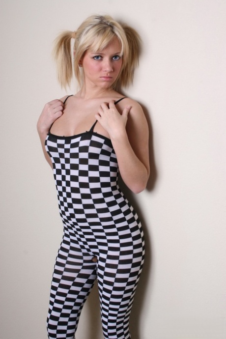 Young blonde girl Danielle Lynn peels off checked bodysuit to expose herself 85932041