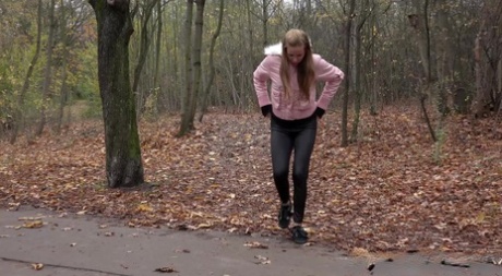 Caucasian female Grace pulls down her pants and proceeds to piss on a path 22482641