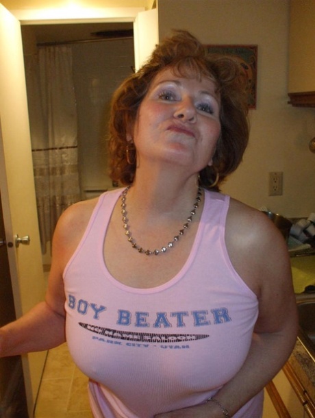 Busty older lady Busty Bliss pleasures a small cock during POV action 81802378