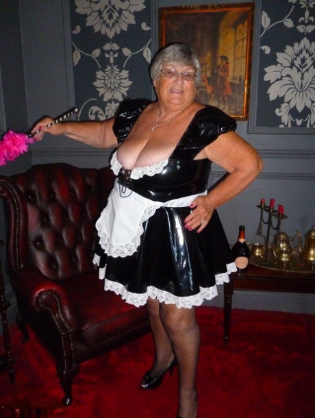 Fat old maid Grandma Libby doffs her uniform to pose nude in stockings 99643015