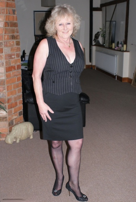 Dirty granny in pantyhose Claire Knight fingers her own soft mature cunt