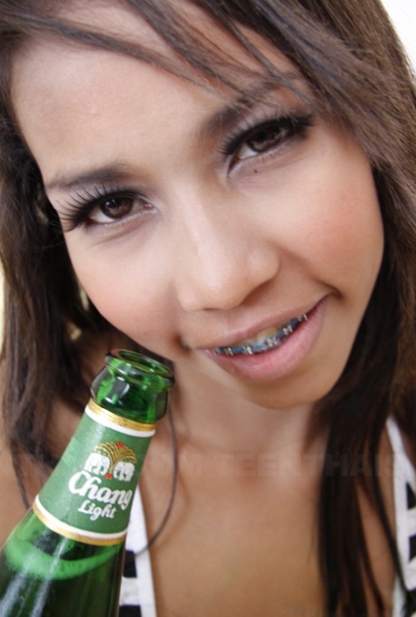 Thai girl Sofie shows her braces before oral and vaginal sex with a Farang 73428494