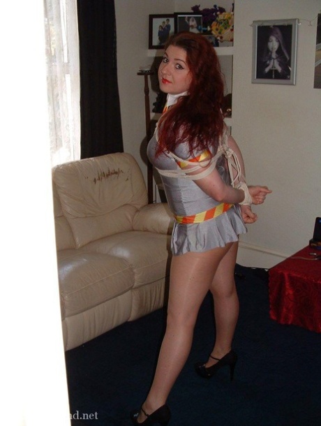 Plump schoolgirl exposes her upskirt panties while bound and ball gagged 28174632