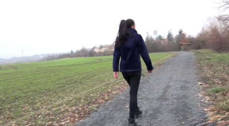 Caucasian girl Amanda Estelapisss on a path through an open field 84250644