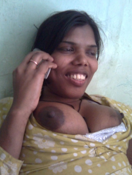 Indian woman exposes her large boobs and upskirt panties in bedroom 55284965