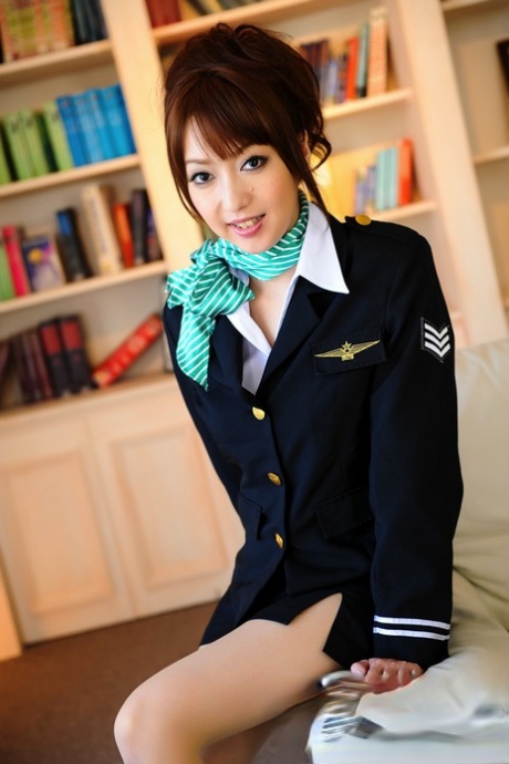 Japanese girl with a pretty face model non nude in pilot attire and pantyhose 55373331