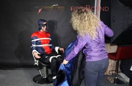 Blonde girl is tied up while ball gagged and blindfolded in nylon clothing 78907202