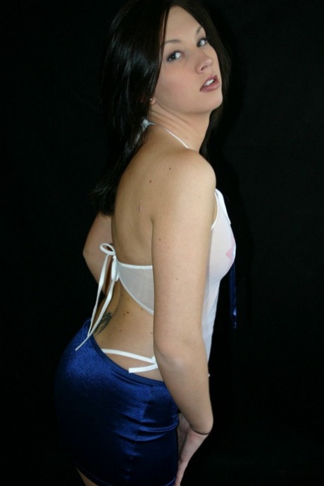 Brunette teen models for a tease shoot during a solo performance 31417921
