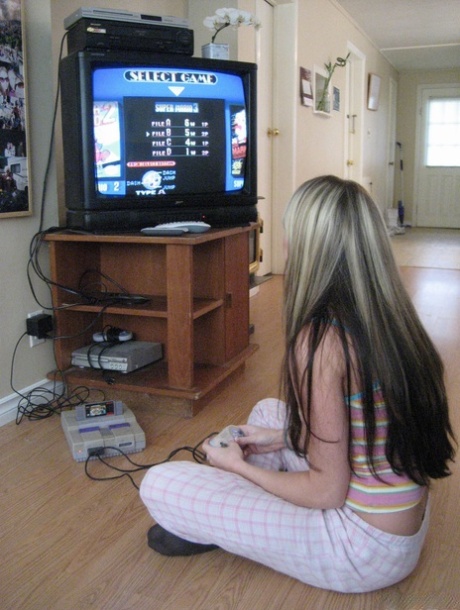 Dirty blonde gamer girl goes topless in a safe for work fashion 19628205