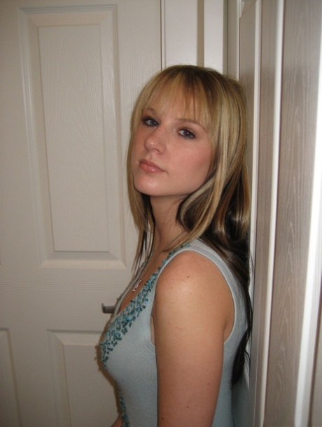 Blonde teen removes a dress for her first nude modelling gig 55716240