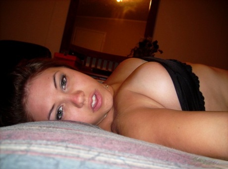 Chubby amateur with short hair and big tits takes a series of self shots 55944129
