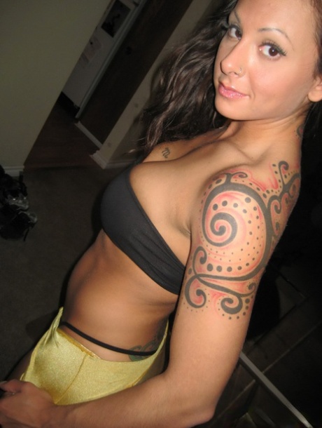 Sexy girl Zoe takes off her tube top while wearing a thong 24502487