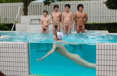 Japanese redhead gets gangbanged after going for a skinny dip 14333415