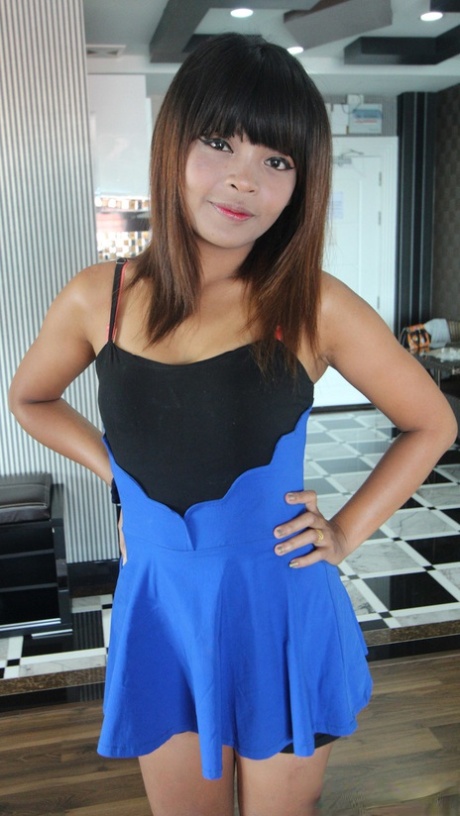 Tiny Thai girl Penny undresses prior to fucking a sex tourist 16266967