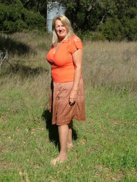 Old amateur Adonna bares her big tits and bald cunt with the sun in her eyes 45873377