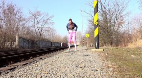 Solo girl Valentina Ross pulls down her leggings to piss near railway tracks 37579154