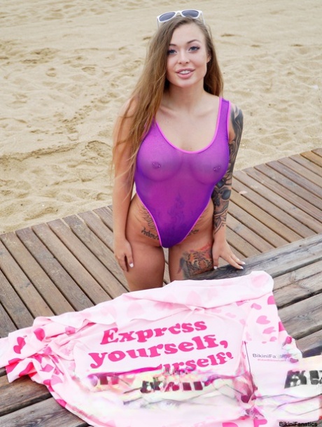 Solo girl Misha Maver changes into a swimsuit while on a boardwalk 57664026