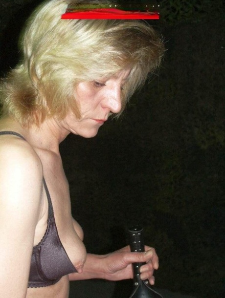 Blonde woman Uschi Haller tops a male slave in her bra and thong 42642328