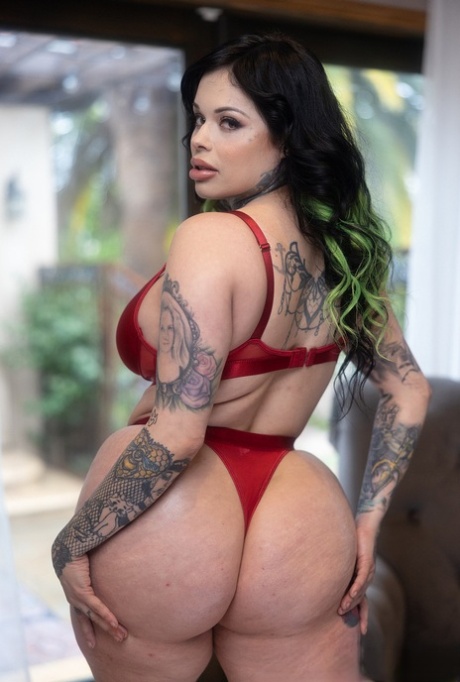 Tattooed Latina MILF Xwife Karen poses by herself before fucking on a bed 45976628