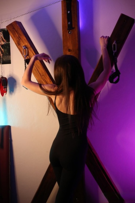 Viks Angel gets naked in front of a St Andrew's Cross prior to masturbating 40744909
