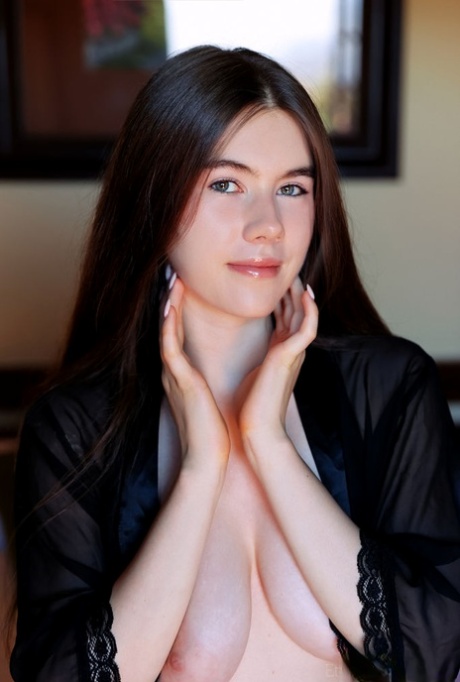 Beautiful teen Marichka Glory looses her robe to show her great body 63170316
