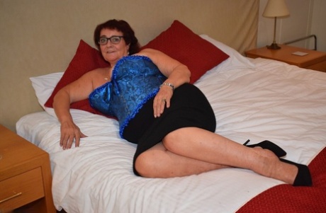 Overweight granny Phillipas Ladies undoes her bustier during solo action 13545609