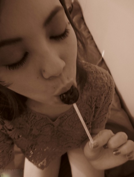 Amateur Japanese Sydney Mai having fun toying and licking with lollipop 63260282