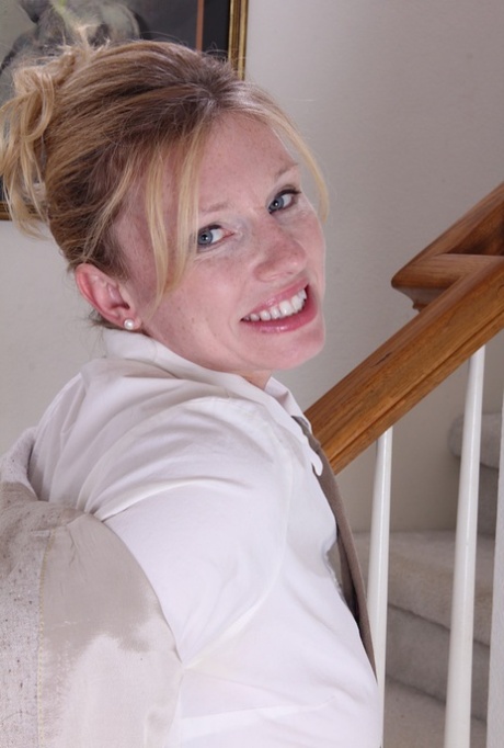 Smiley MILF in dress clothes strips down and exposes her trimmed gash 13511870