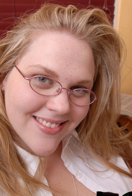 Fat blonde chick in glasses Christina lets her huge fat juggs loose 85305189