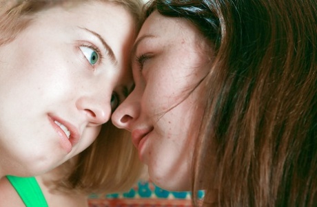 Lesbians Carly T and Kara D share kiss before fingering each others pussy 47359138