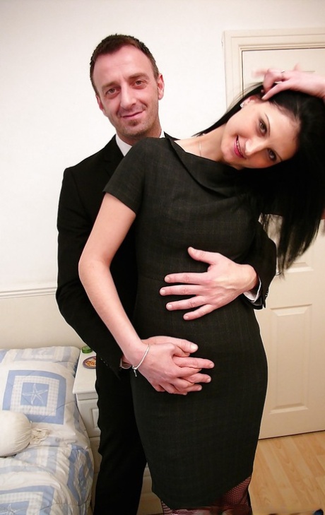 Amateur European brunette Eva Johnson spreading shaved twat in stockings 27564741