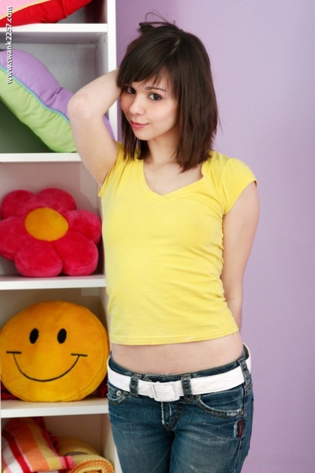 Svelte teen brunette Ariel Rebel stripping and exposing her petite body 88038091