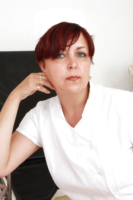 Lustful mature nurse spreading her legs and masturbating her cunt 31325470